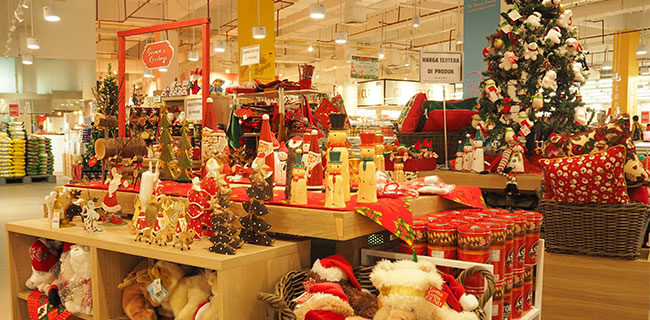 Christmas merchandising display set-up in middle of a department store